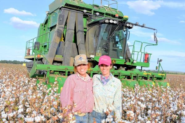 Sisters Avanell and Haddie Morawitz picking their trial plot