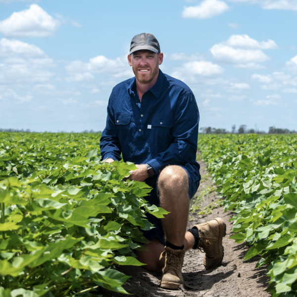 Aaron Kiely kneeling in field