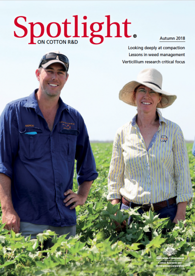 Cover of Spotlight Magazine - Autumn 2018. A cotton grower and a researcher standing in a cotton crop.